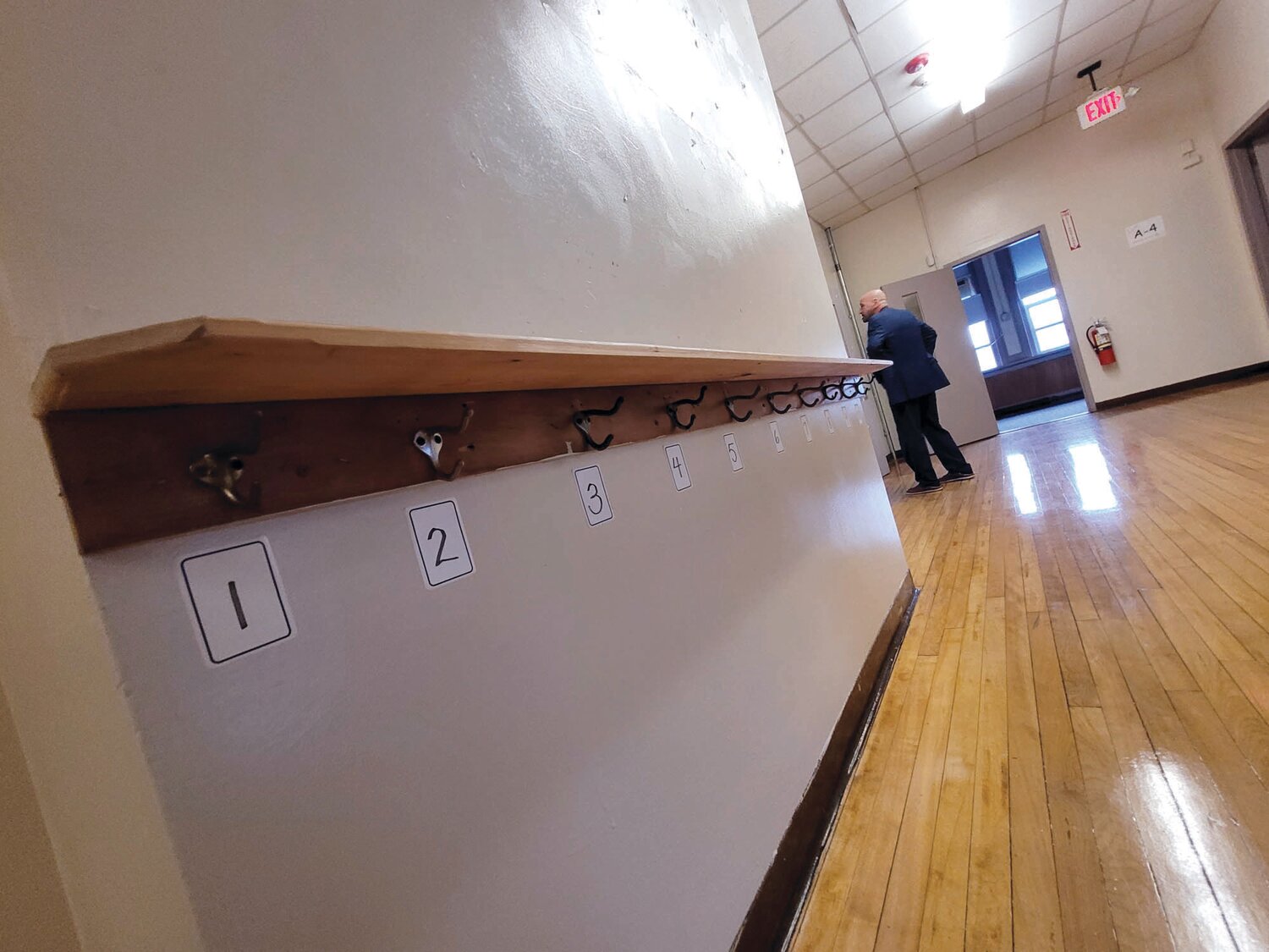 TENDER HOOKS: Tri-County President & CEO Joe DeSantis recently gave a tour of the agency’s newest acquisition, Johnston’s George C. Calef Elementary School at 7 Waveland St. Tri-County paid the town $1 million in cash for the building.